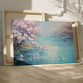 Framed canvas print of a serene landscape with cherry blossoms over tranquil waters