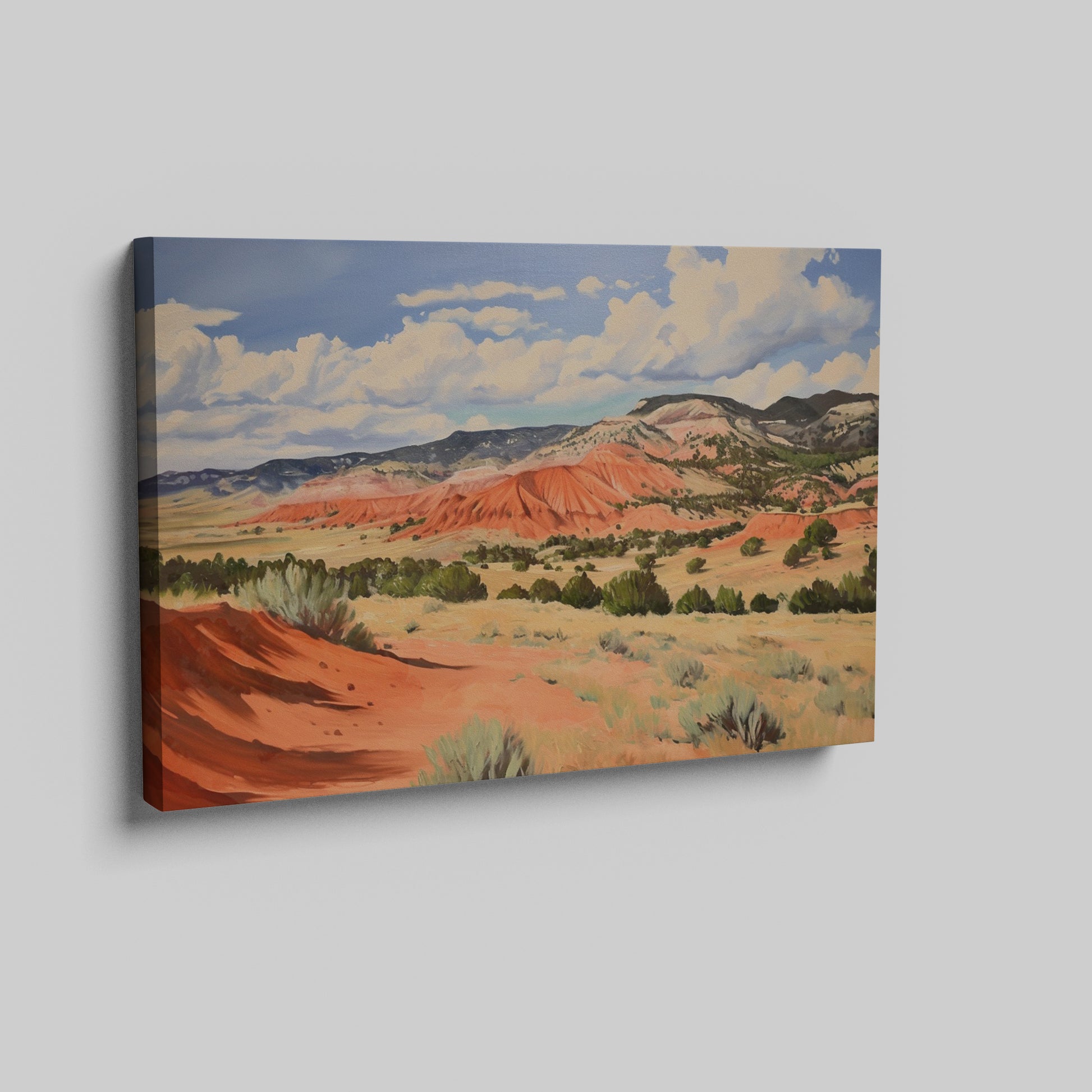 Framed canvas print of impressionistic desert hills with vivid red, earthy beige, and lush green tones