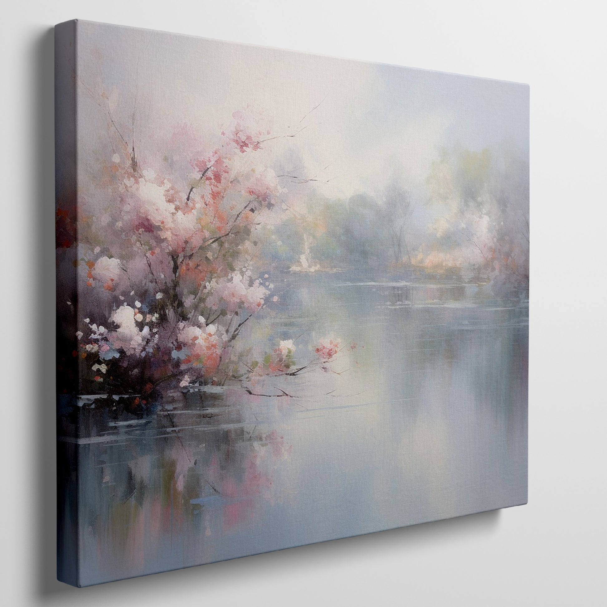 Framed canvas print depicting impressionist art of blossoming trees by a misty lake with soft pastel colours