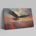 Framed canvas print of a majestic eagle in flight over a canyon at sunset with warm shades of orange and blue