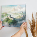 Framed canvas print of the Great Wall of China amidst a misty, mountainous landscape