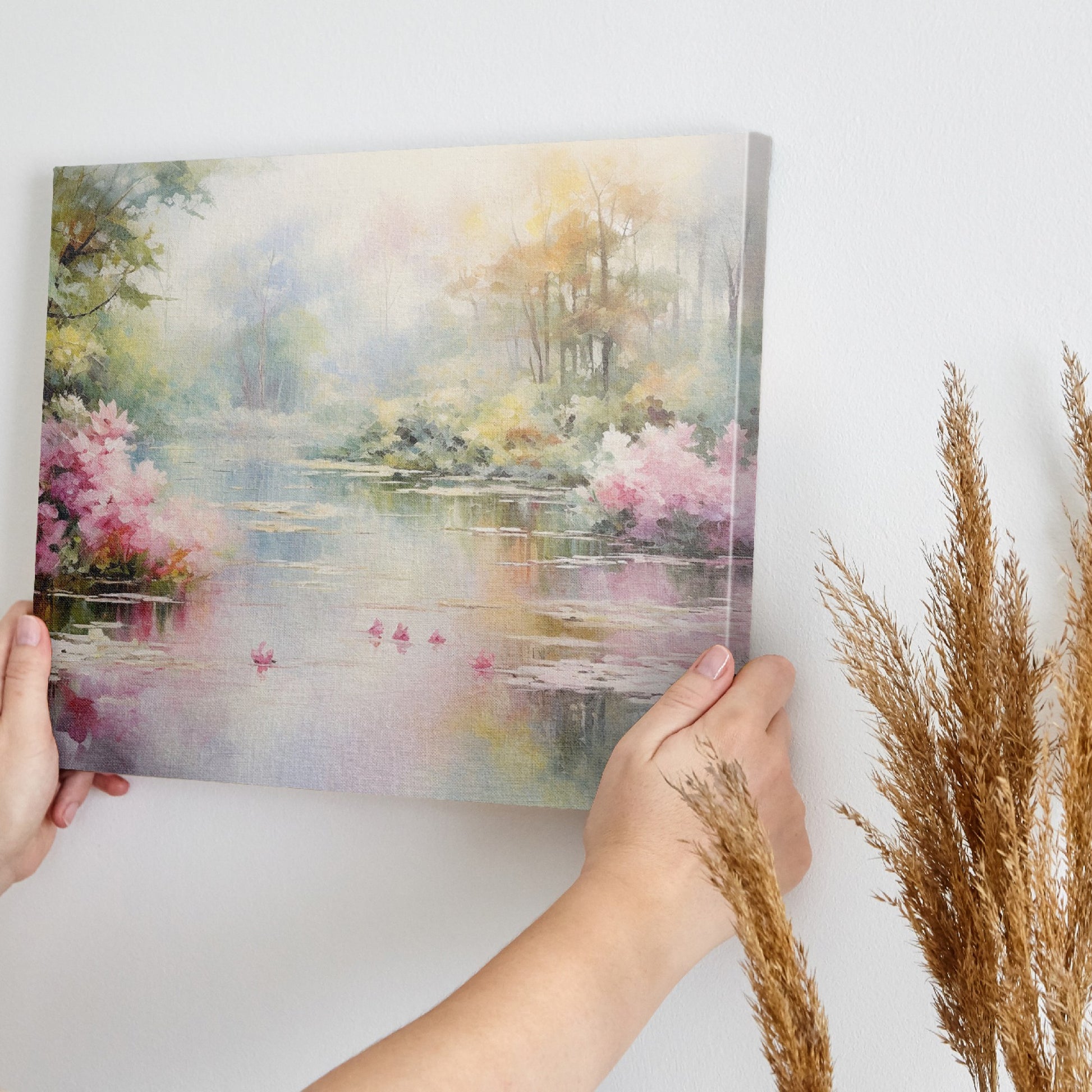 Framed canvas print of a serene impressionistic painting featuring a lake, azalea blooms, and a reflection of trees