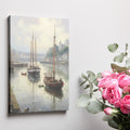 Framed canvas print of a tranquil harbour with vintage sailboats and quaint buildings