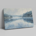 Framed canvas print of a serene lakeside watercolor painting with soft blue and grey tones