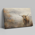 Framed canvas print of a Highland cow in a misty autumnal landscape with warm earthy tones