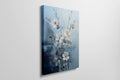 Framed canvas print of elegant flowers and berries against a blue abstract background