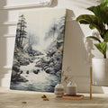 Framed canvas print of a tranquil mountain stream with misty forest backdrop