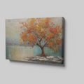 Framed canvas print of a textured autumnal tree with orange and gold foliage by a serene lake