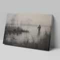 Framed canvas print of a fisherman in a foggy, monochrome lake landscape