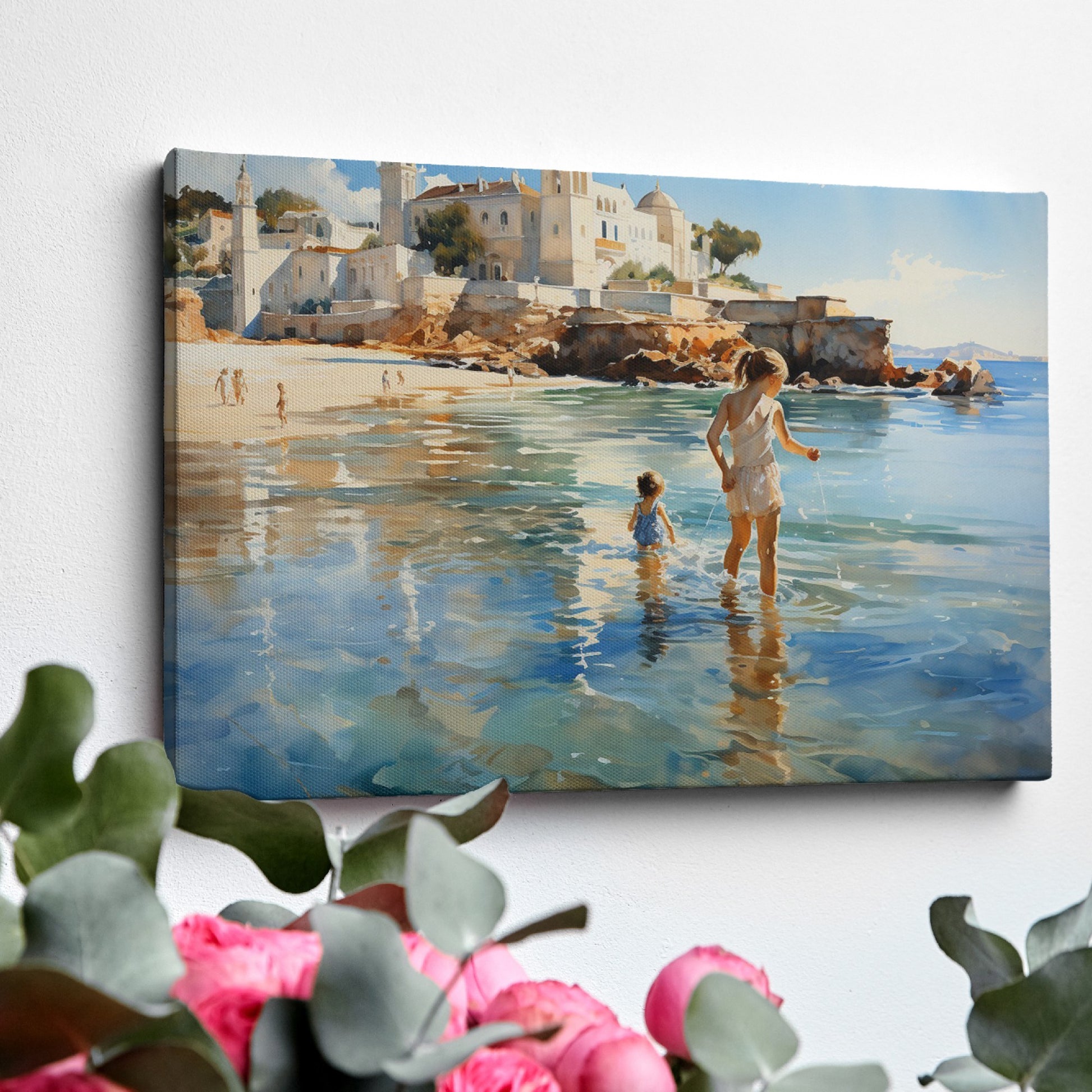 Framed canvas print of a sunlit Mediterranean beach with a mother and child