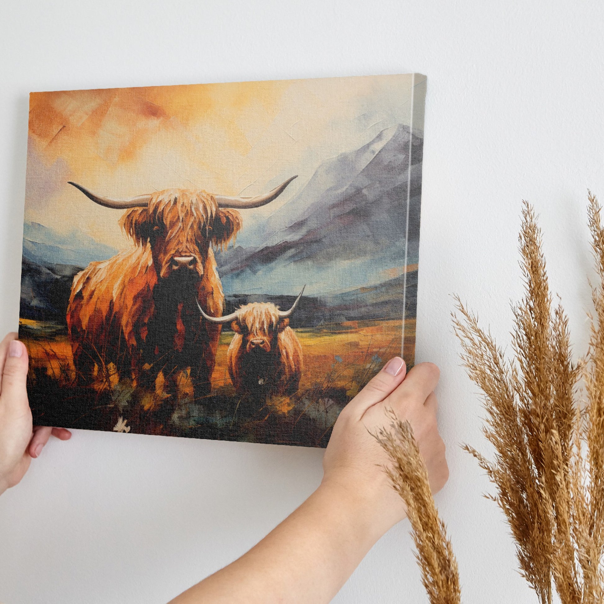 Framed canvas print featuring vibrant Highland cattle with mountain landscape