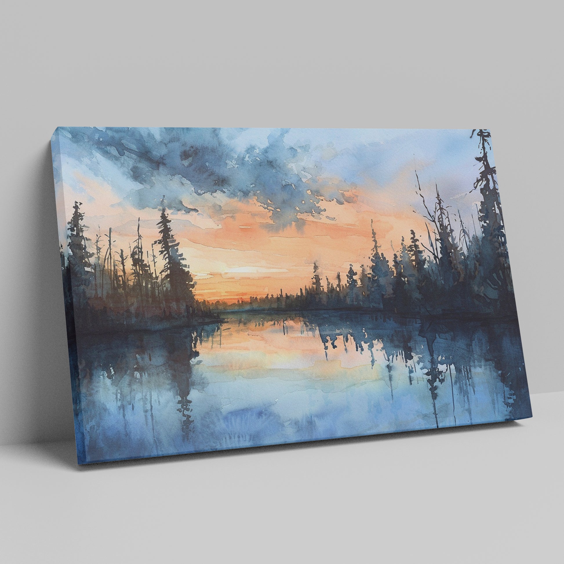 Framed canvas print of a tranquil watercolor landscape depicting a serene lakeside at sunset with reflections of woodland