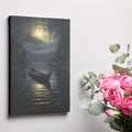 Framed canvas print of a serene moonlit scene with a person canoeing on a calm lake surrounded by forest