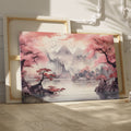 Framed canvas print of Asian landscape with cherry blossoms and misty mountains