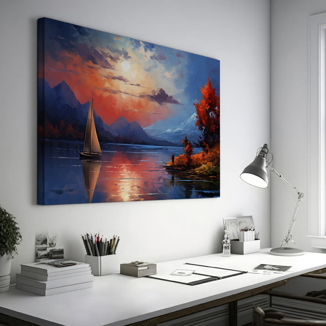 Framed canvas print of an impressionist landscape with a sailboat during sunset, featuring autumnal colours and mountain scenery