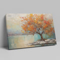 Framed canvas print of a textured autumnal tree with orange and gold foliage by a serene lake