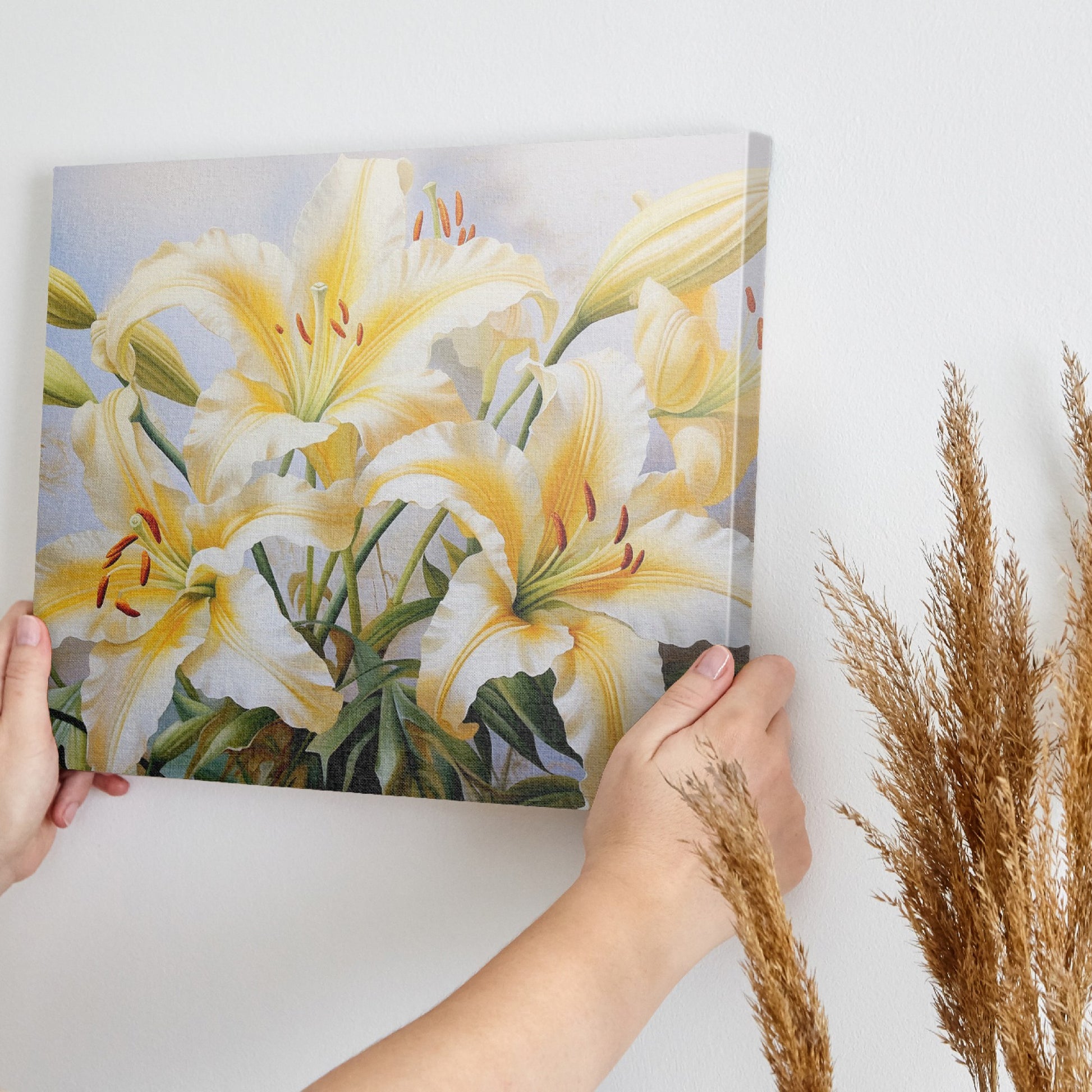 Framed canvas print of realistic sunlit yellow daylilies with lush green leaves