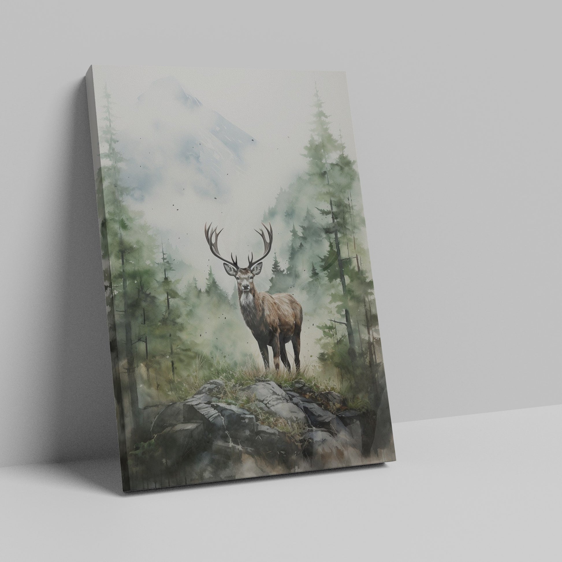 Framed canvas print of a majestic stag set against watercolour misty mountains and a lush forest