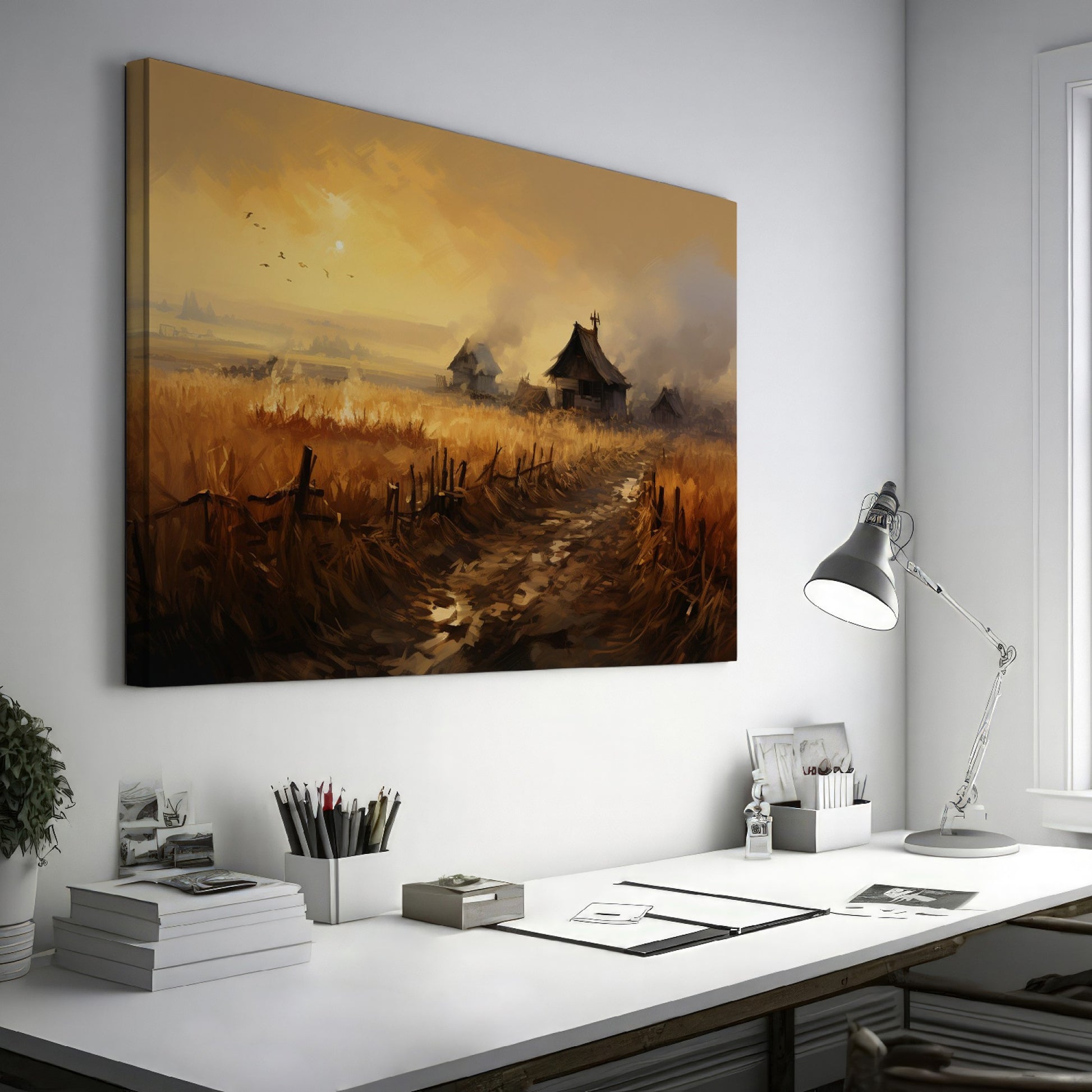 Framed canvas print of a rustic countryside at sunset with golden fields and cottages