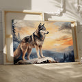 Framed canvas print of a majestic wolf overlooking a forest landscape at sunset