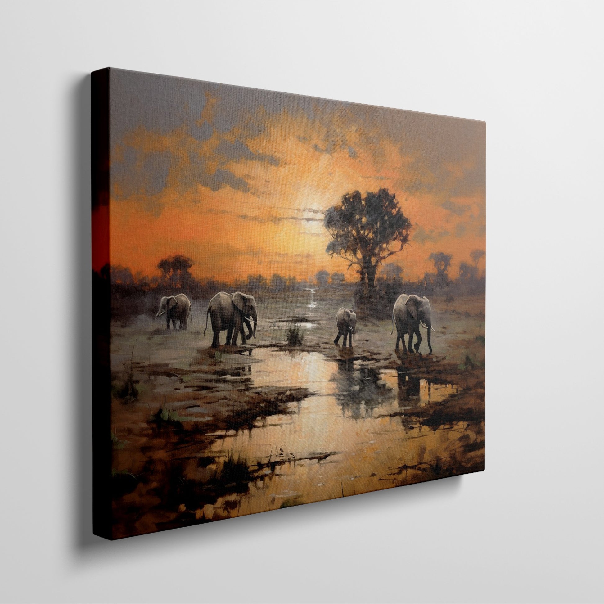 Framed canvas print of African elephants walking beside water during a vibrant sunset