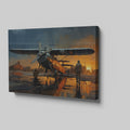 Framed canvas print of a vintage biplane at sunset with pilot walking and the aircraft's reflection on the wet ground