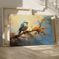 Framed canvas print of a stylised blue bird sitting on a branch with impressionistic brushstrokes