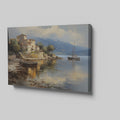 Framed canvas print of a Mediterranean coastal village with boats and serene sea reflections