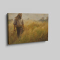 Framed canvas print of a man walking through a golden wheat field during sunset with a rustic feel