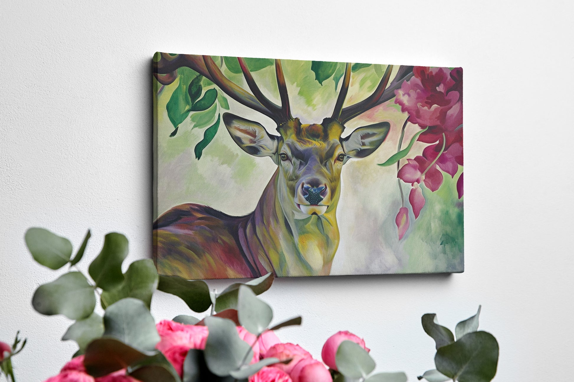 Framed canvas print of a vibrant stag with colourful floral surroundings