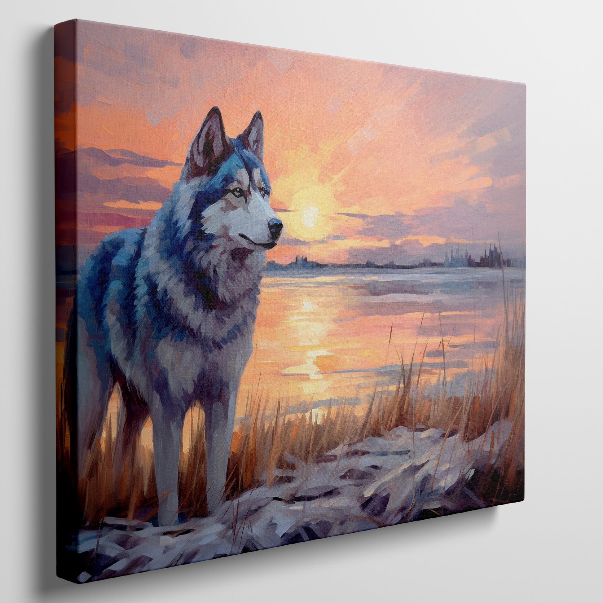 Framed canvas print of a Husky in silhouette against a colourful sunset with reflection on water