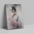 Framed canvas print of an elegant figure with cherry blossoms in soft pastel tones