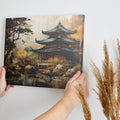 Framed canvas print of an oriental pagoda surrounded by autumn trees and reflection on water