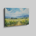 Framed canvas print of a scenic watercolor vineyard landscape with lush greenery and open sky