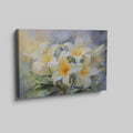 Framed canvas print of impressionist style lilies in vibrant cream and yellow hues