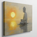 Framed canvas print of a meditative figure with the sun setting over water, reflecting golden tones