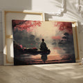 Framed canvas print of a serene digital painting with a figure sitting near water, reflecting cherry blossoms and a city silhouette