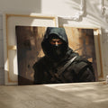 Framed canvas print of a dark and mysterious ninja warrior with intense gaze and sword