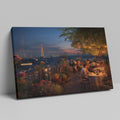 Framed canvas print of a romantic rooftop dining scene in Paris with Eiffel Tower in the background