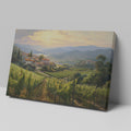 Framed canvas print of a Tuscan vineyard at sunset with warm golden hues and terracotta houses