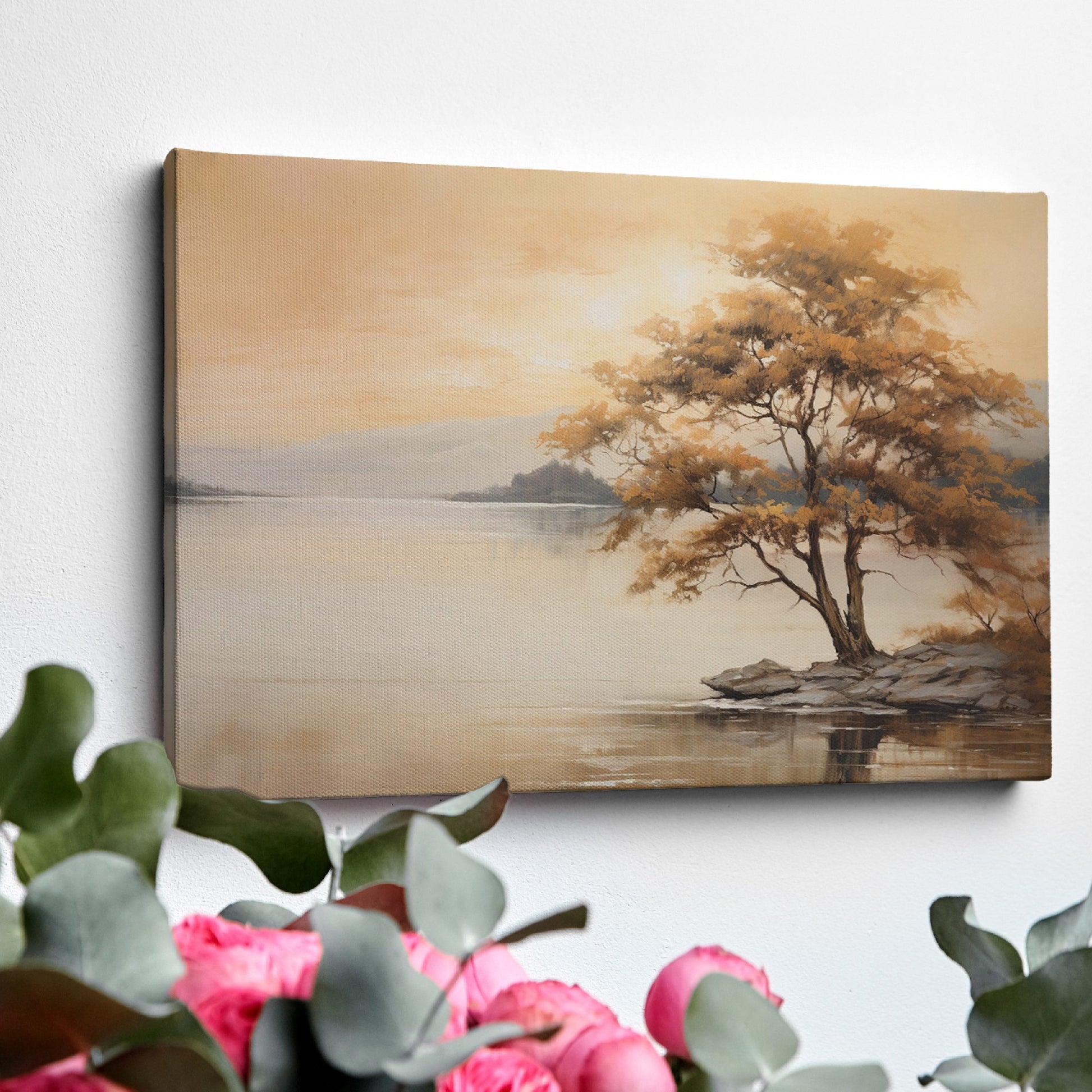 Autumnal landscape with a golden tree on a lakeshore and reflection in the water