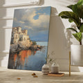 Framed canvas print of a Mediterranean coastal village during sunset with golden reflections on water