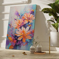 Framed canvas print of vibrant, textured impasto flowers in bright orange, purple, and blue hues