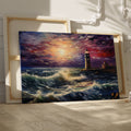 Framed canvas print of a dramatic sunset over a tempestuous sea with a lighthouse