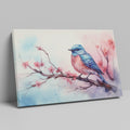 Framed canvas print of a vibrant bluebird on cherry blossom branch in watercolor