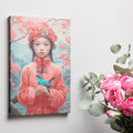 Framed canvas print of an Oriental girl in traditional pink attire with a blue bird and cherry blossoms