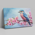 Framed canvas print of a colourful bird on a blossoming cherry branch