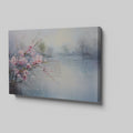 Framed canvas print of impressionist cherry blossoms overlooking a tranquil lake