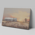 Framed canvas print of a rustic barn surrounded by tranquil fields at sunset, with warm golden and earthy tones.