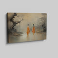 Framed canvas print of monastic figures in saffron robes by a misty river amidst autumn trees